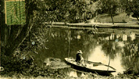 Pêcheur en barque/sur le petit bras de la Seine