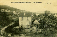 Maisons en bordure du chemin de fer/vers Médan
