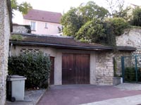 Hangar municipal à l'emplacement de l'ancien lavoir